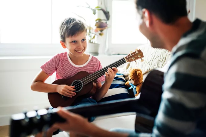 children playing guitar